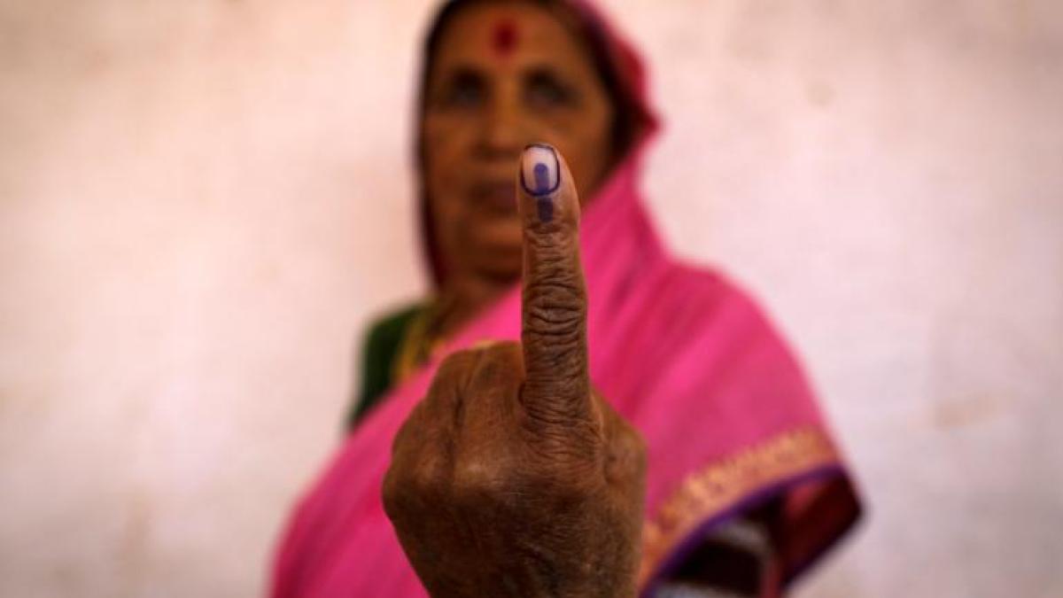 Karnataka Assembly elections 2023: Voter showing finger with indelible ink